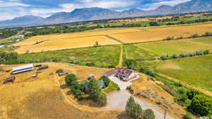 Bird's eye view featuring a rural view and a mountain view