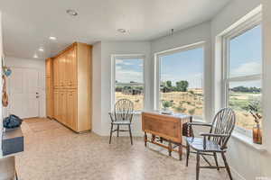 Living area featuring recessed lighting and baseboards