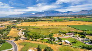 Birds eye view of property featuring a rural view and a mountain view