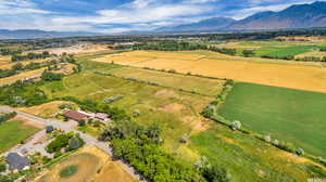 Drone / aerial view with a mountain view and a rural view