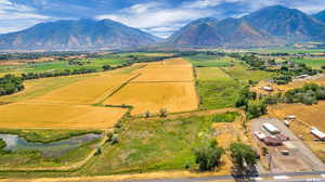 Drone / aerial view featuring a mountain view and a rural view