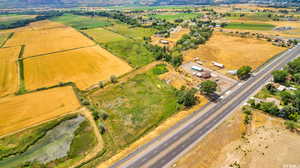 Birds eye view of property with a rural view