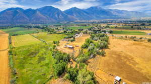 Birds eye view of property featuring a rural view and a mountain view