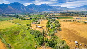 Drone / aerial view with a mountain view and a rural view