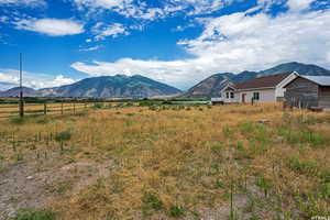 Property view of mountains with a rural view