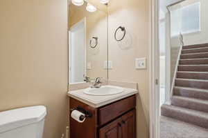 Bathroom featuring toilet and vanity