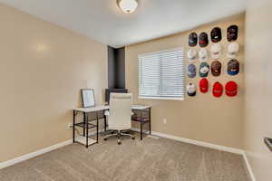 Office featuring carpet and baseboards