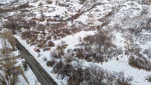 Snowy aerial view with a mountain view