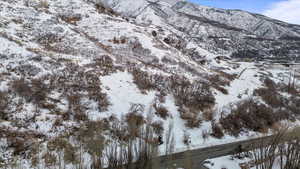 Snowy aerial view with a mountain view