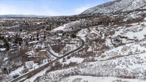 Snowy aerial view with a mountain view