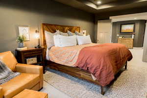 Bedroom featuring recessed lighting and light carpet