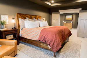 Bedroom featuring light colored carpet and recessed lighting