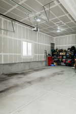 Garage featuring a garage door opener