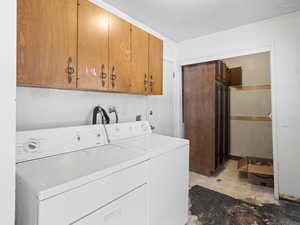 Laundry room off kitchen on way to extra deep 2 car garage.