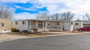 View of front of property featuring a porch