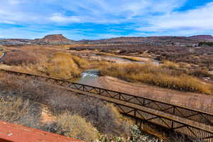 Property view of mountains with a water view