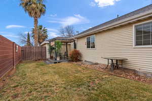 View of yard featuring a fenced backyard and a wooden deck