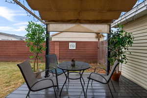 View of patio / terrace featuring outdoor dining space and fence