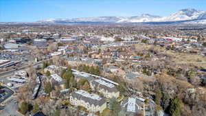 Drone / aerial view featuring a residential view and a mountain view