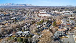 Drone / aerial view featuring a residential view and a mountain view