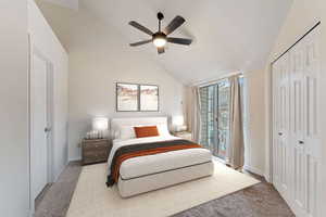 Bedroom featuring vaulted ceiling, access to outside