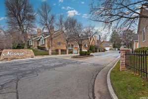 View of street with a residential view and curbs