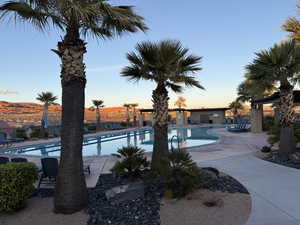 Community pool with a patio