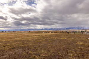 Property view of mountains with a rural view