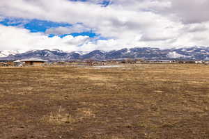 Property view of mountains with a rural view