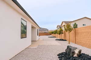 View of yard with a patio area and a fenced backyard