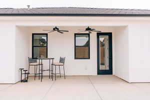 View of patio with ceiling fan