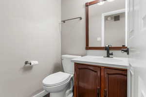 Bathroom with toilet and vanity