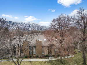 View of front of house with a mountain view