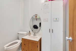 Bathroom featuring toilet and vanity