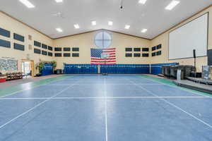 View of tennis court with ceiling fan