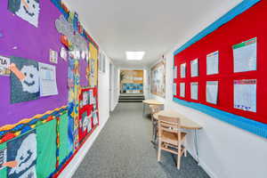 Corridor with carpet floors