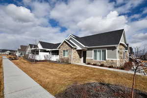 View of front of house with a front lawn