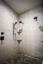 Bathroom with a tile shower