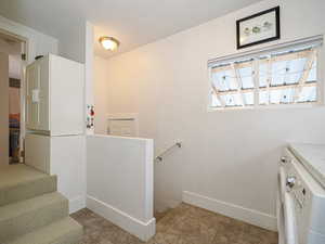 Stairs to basement & outside to the right and stairs to left lead to 3rd bedroom