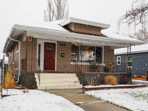 Classic brick bungalow with south-facing covered porch