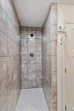 Bathroom with a tile shower