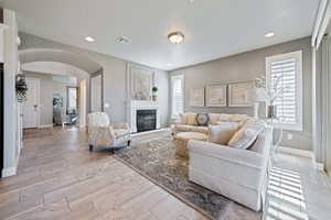 Living room with light hardwood / wood-style floors