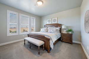 View of carpeted bedroom