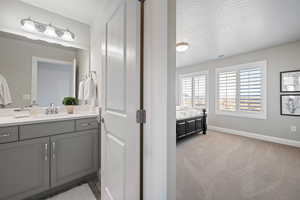 Bathroom featuring vanity