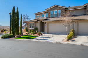 View of front of home featuring a garage