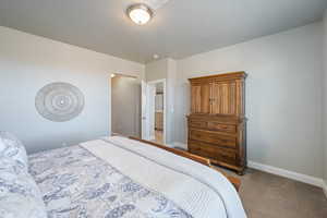 View of carpeted bedroom