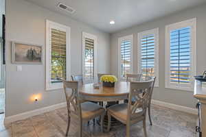 Dining room with a wealth of natural light