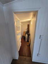 Corridor featuring dark hardwood / wood-style floors