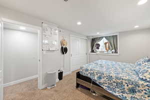 Large Side: Bedroom 3 with visible vents, baseboards, carpet, a closet, and recessed lighting