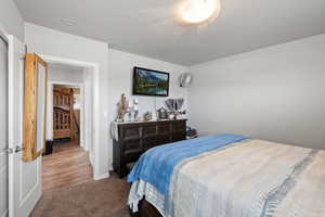 Large Side: Bedroom 1 featuring carpet flooring and baseboards